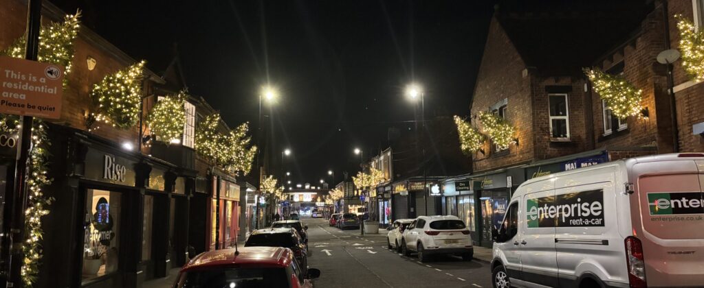 Contact us Image of Acorn Road with Christmas lights 2026